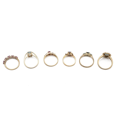 12 - Six 9ct gold modern rings, set with various gemstones, 11.66g.