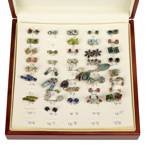 133 - Various gem set and silver earrings, pendants and rings, are contained in fitted display cases, appr... 