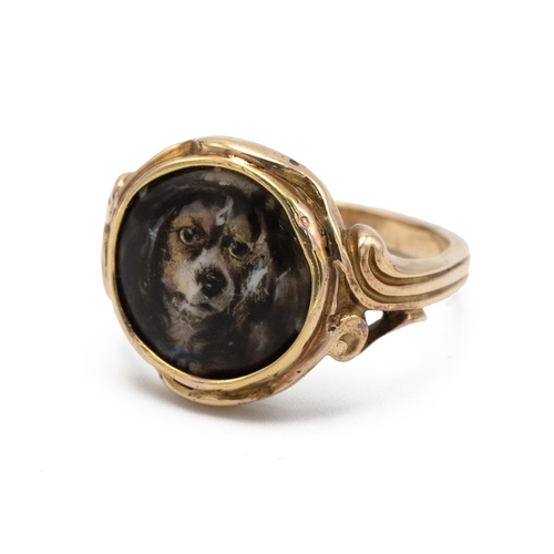 14 - W. Essex ceramic panel set ring, the image of a dog, signed to the reverse ‘W. Essex 1861(), the mou... 