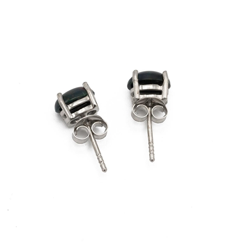 141 - Pair of synthetic black opal ear studs, set in silver.