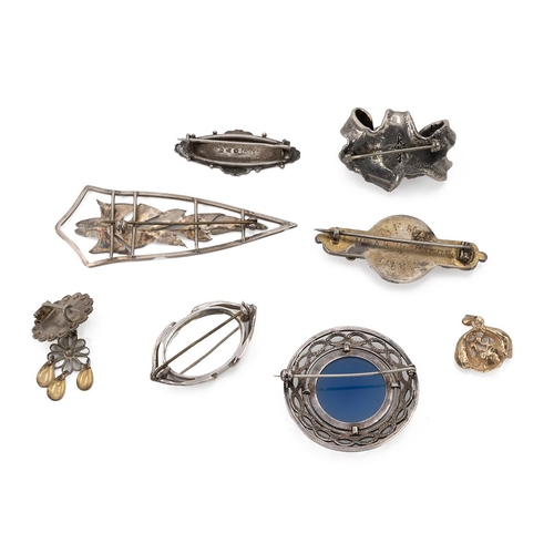 173 - Mid-century/vintage silver brooches, including an amethyst set brooch, a 1950s bar brooch set with r... 