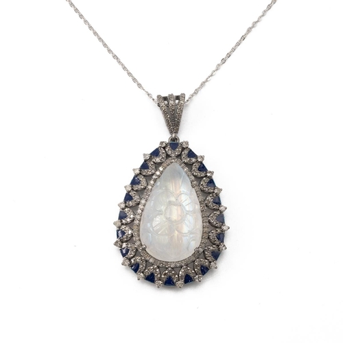 179 - A moonstone, sapphire and diamond pendant, the carved moonstone enclosed by small diamonds and sapph... 