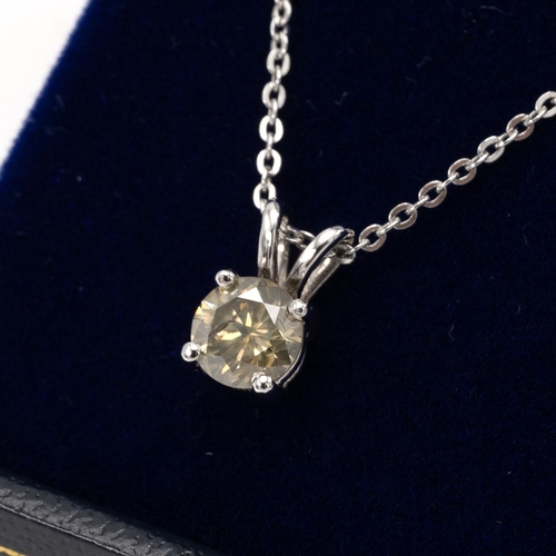 189 - A diamond pendant on a chain, the brilliant-cut accompanied by a W G I  certificate dated 01-08-2023... 