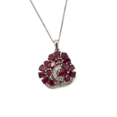 191 - Ruby and diamond cluster pendant on a chain, stamped ’925’.