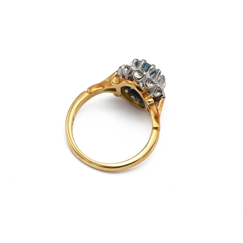 2 - An 18ct yellow gold aquamarine and diamond oval cluster ring, ring size I1/2, total gross weight app... 