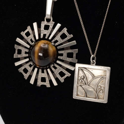 205 - Mid-century Swedish silver abstract pendant and chain, set with cabochon tiger eye, along with a vin... 