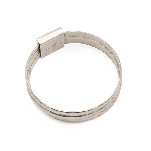 206 - Burberry silver triple bangle, set with a square panel and coloured enamelled cells, 6.6cm internal ... 