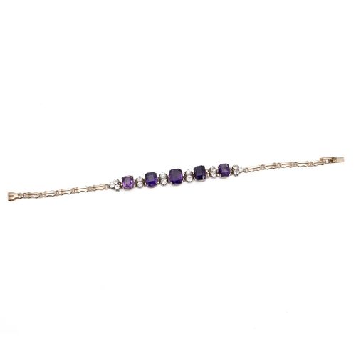 218 - An amethyst and white sapphire bracelet, in unmarked yellow metal, 17.5 cm long, 10g gross, possibly... 