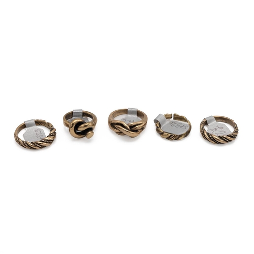 22 - Mid-century Scandinavian bronze rings, includes two rope twice examples, two-knot rings and one othe... 