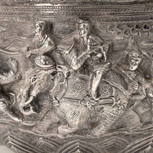 246 - Burmese late 19th-century silver bowl, embossed with various figures and buildings throughout, possi... 