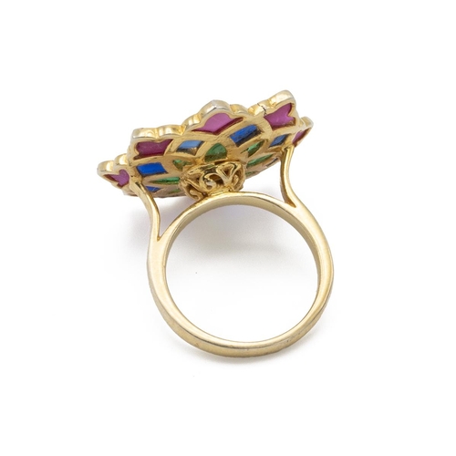 26 - Lasque cut diamond and cold enamel cluster ring, of flower head design, the gilded mount stamped ‘92... 