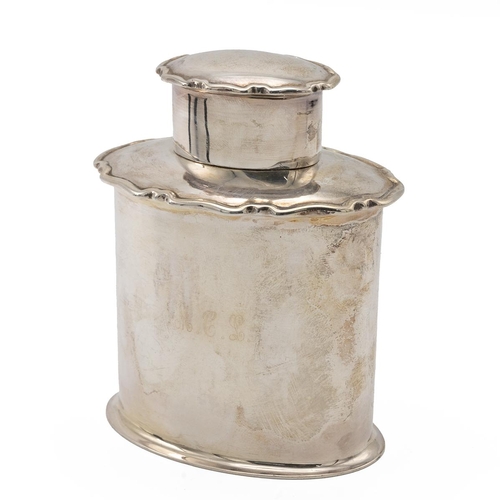 272 - Silver tea caddy, of oval form, with pull-off lid and shaped outline, Sheffield 1907, Atkin Brothers... 