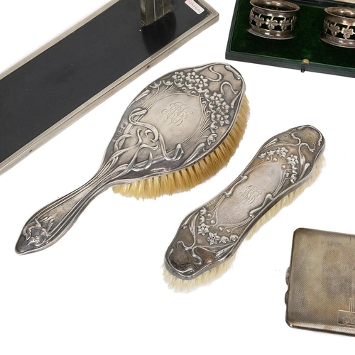 285 - Various silver items including a silver Art Deco compact, Goldsmiths & Co, a cigarette case, cruet s... 