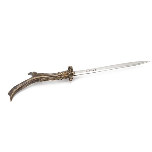 294 - A silver letter opener, with naturalistic handles, total weight 310g Birmingham 1975, J B Chatterley... 