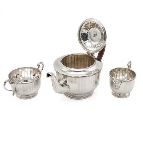 310 - Silver Art Deco three-piece tea service, retailed by Garrard, marked Birmingham 1926, Adie Brothers,... 