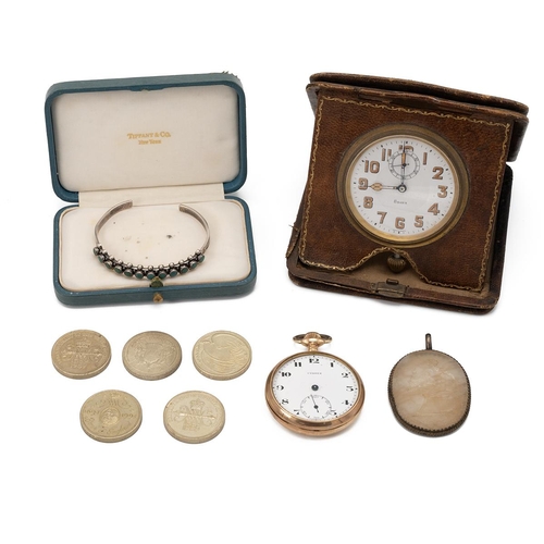 315 - Folding 8 day manual wind travel clock, early 20th century, leather case with cloth lining. 54mm whi... 