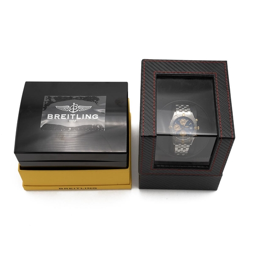 323 - Boxed Breitling Men's Chronomat automatic wristwatch. Ref B13352, Serial no. 458988. Stainless steel... 