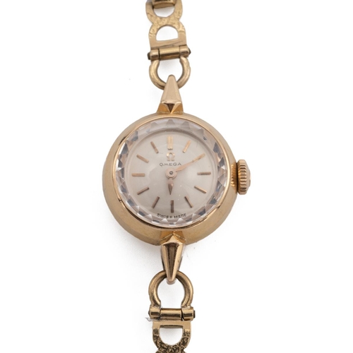 341 - Omega vintage lady's 9ct yellow gold bracelet watch. 17mm case, manual wind, cream dial with gold ho... 