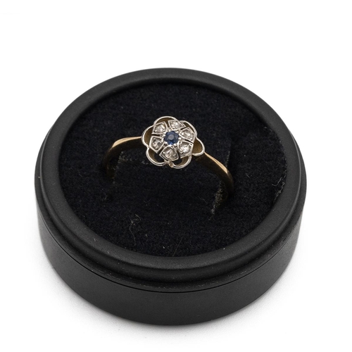 37 - A sapphire and rose diamond cluster ring, the shank marked 18ct, finger size Q 1/2, 2g gross. 