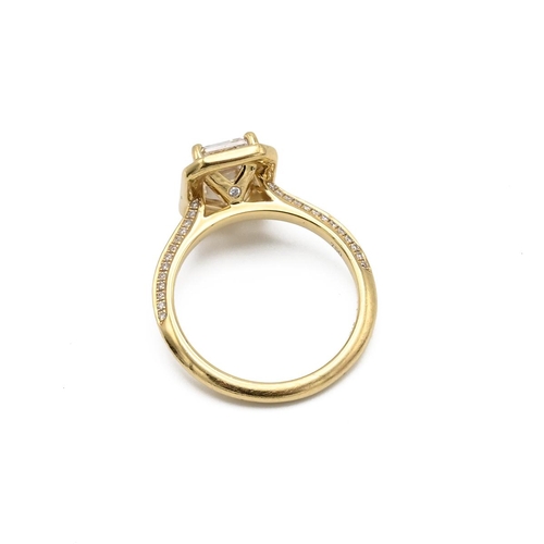 4 - An 18ct yellow gold and diamond ring, set with a mixed step cut diamond, approximately 7.88 x 5.47mm... 