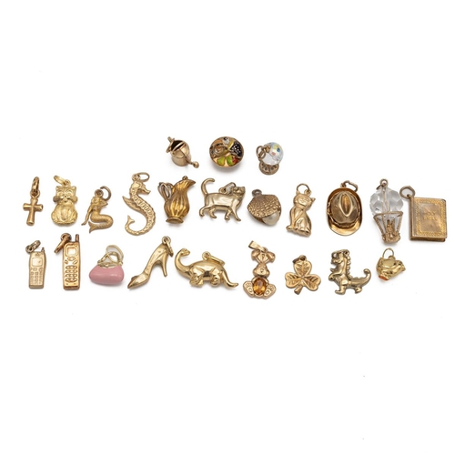 43 - 9ct gold charm bracelet, along with various other 9ct gold and gold plated charms, total weight 20.3... 