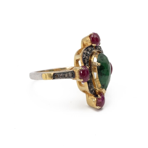 58 - Emerald, ruby and diamond ring. The central emerald enclosed by rose cut diamonds and rubies at the ... 