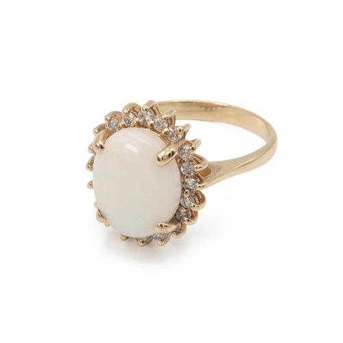 60 - Opal and diamond cluster ring, the oval cabochon of approximately 2ct estimated, enclosed by small b... 