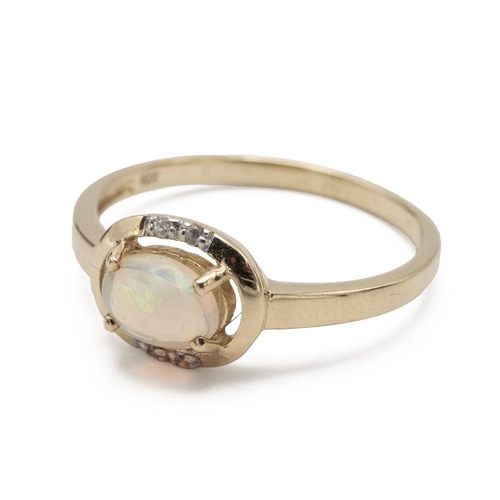 64 - Opal and diamond dress ring, the shank stamped ‘375’, finger size P 1/2, 1.8g gross.