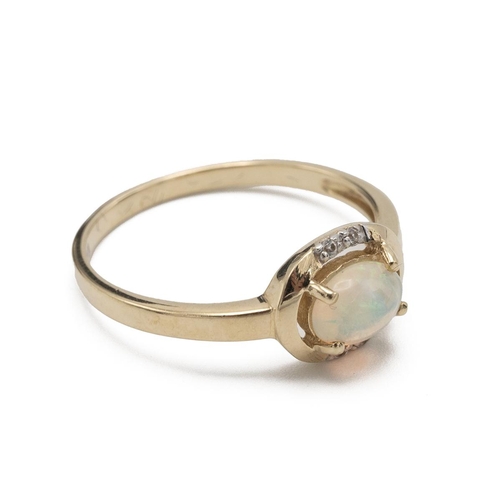 64 - Opal and diamond dress ring, the shank stamped ‘375’, finger size P 1/2, 1.8g gross.