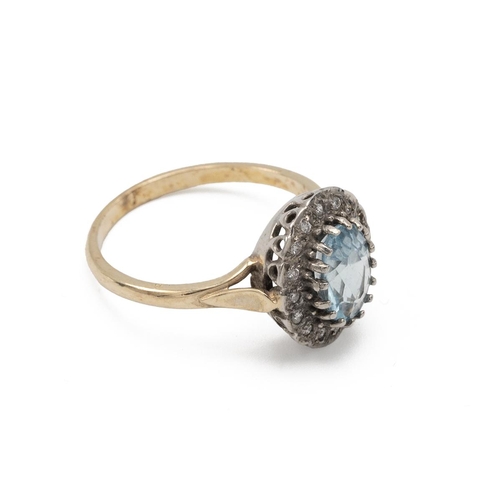 65 - 9ct gold, blue topaz and diamond cluster ring, finger size O 1/2, 3g gross.