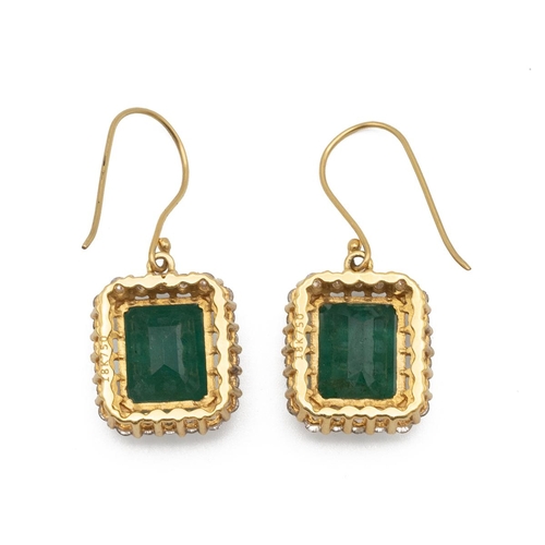 70 - A pair of emerald and diamond drop earrings, the step cut emeralds measuring approximately 11 by 9 b... 