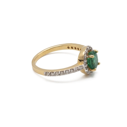 71 - Emerald and diamond cluster ring, the oval cut emerald enclosed by sixteen diamonds and a line of ei... 