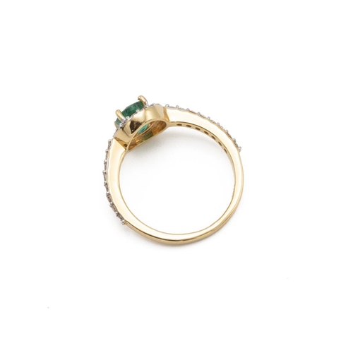 71 - Emerald and diamond cluster ring, the oval cut emerald enclosed by sixteen diamonds and a line of ei... 