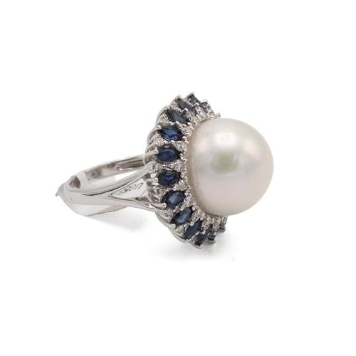 82 - A South Sea cultured pearl, diamond and sapphire dress ring, the 14mm pearl enclosed by alternate se... 