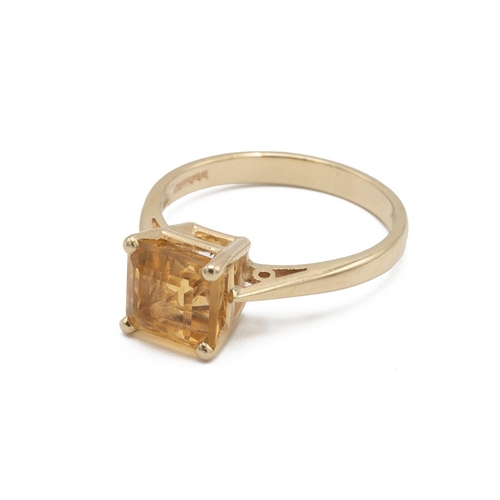 91 - 14ct gold and peridot square set ring, in four-point claw setting, size P 1/2, 3.47g.