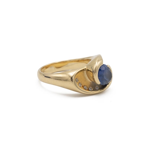 94 - Liz Tyler, a sapphire and diamond 18ct gold ‘Corona’ dress ring, the oval cut stone to a heavy cross... 