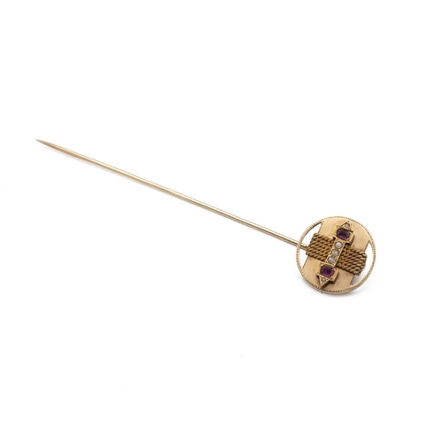 97 - A ruby and seed pearl stickpin, unmarked, tests between 12ct and 13ct gold, Total weight 31.1g, case... 