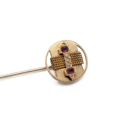 97 - A ruby and seed pearl stickpin, unmarked, tests between 12ct and 13ct gold, Total weight 31.1g, case... 