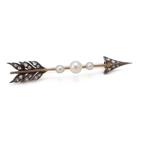 98 - An Edwardian diamond and pearl arrow brooch, the arrow head and flights set with rose cuts, with a t... 