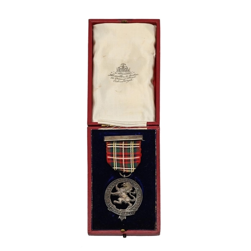 126 - Group of Scottish Clan badges and others. Includes boxed Sterling silver 'The Caledonian Society of ... 