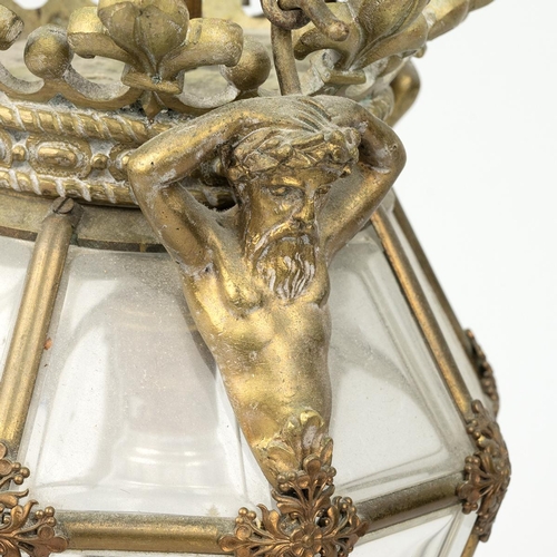 136 - Gilt Brass hall lantern in the French Regence style the acanthus leaf ceiling mount having three bos... 