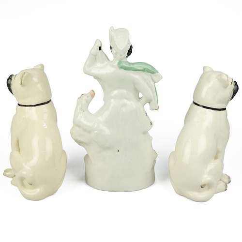 158 - Pair of Staffordshire Pug Dogs with black muzzles, yellow glazed eyes and hilt highlights to the dog... 