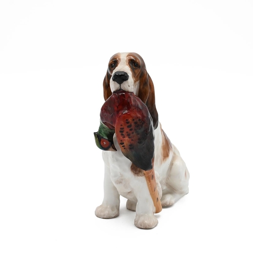 166 - Royal Doulton figurines HN1029 'Cocker Spaniel with Pheasant', HN1103 'Dog with Ball' and HN1158 J'a... 