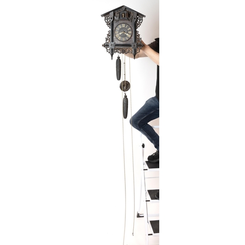 232 - Black Forest carved lime wood Cuckoo Clock with eight day two train weight driven movement marking t... 