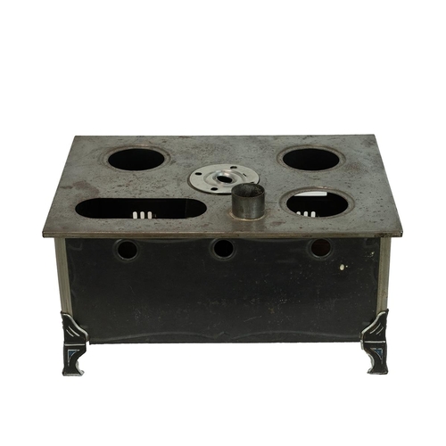 243 - Antique Marklin tinplate stove and pots, early 20th Century. H 20cm, W 37cm, D 29cm.