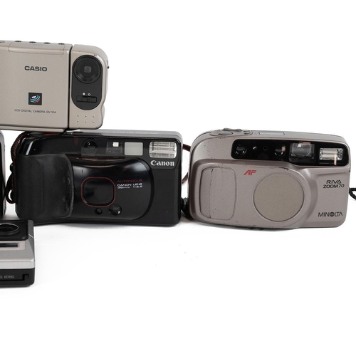 255 - Group of 13 vintage cameras. Including Olympus, Yashica, Canon, Polariod and others. 35mm, disc and ... 