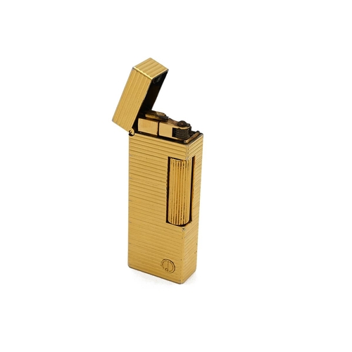 278 - Sterling silver Dunhill bulldog key fob, 74g, and a gold plated Dunhill lighter. (2)