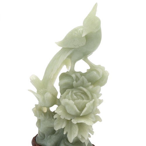 313 - Vintage Chinese carved jade depicting two birds on a flower, on a wooden stand. Overall height 24.5c... 