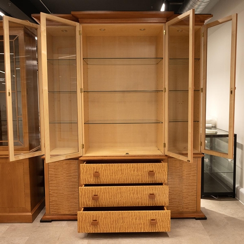 319 - Large bespoke contemporary breakfront display cabinet. Four glazed doors to upper with adjustable gl... 