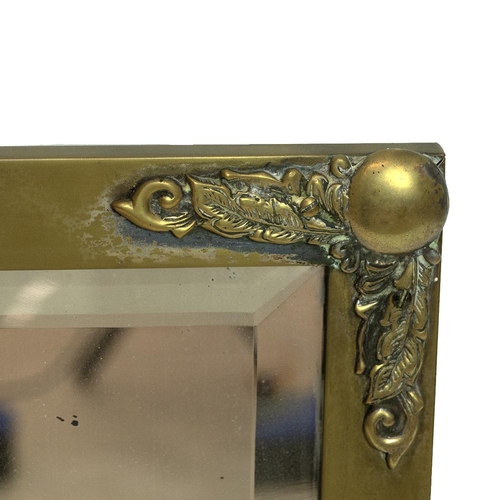 372 - Brass framed mirror, early 20th century with moulded brass detail to corners, bevel edge to mirror p... 